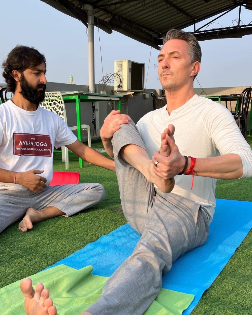 Yoga Teacher Ayush with his student. 