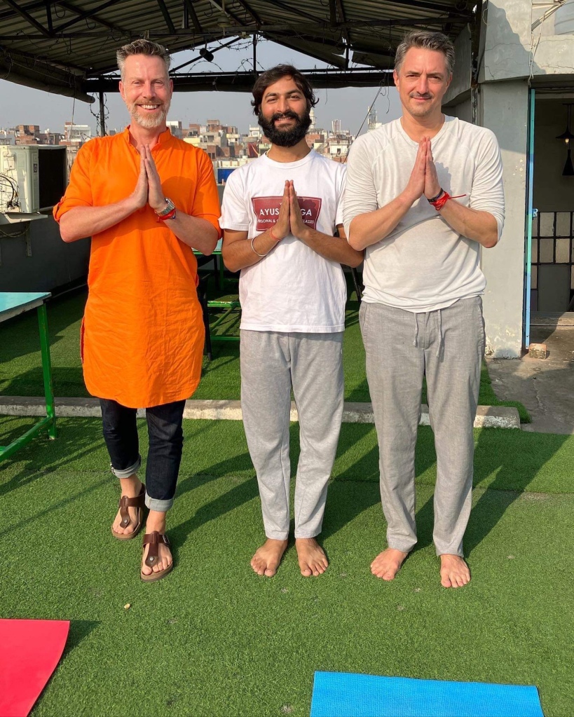 Hathayoga Teacher Ayush with his students after the session in Namaste position. 
Happy guest. 