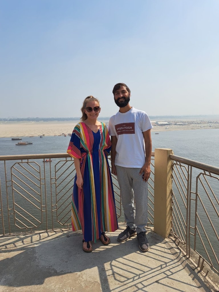 Yoga teacher Ayush with his student. 