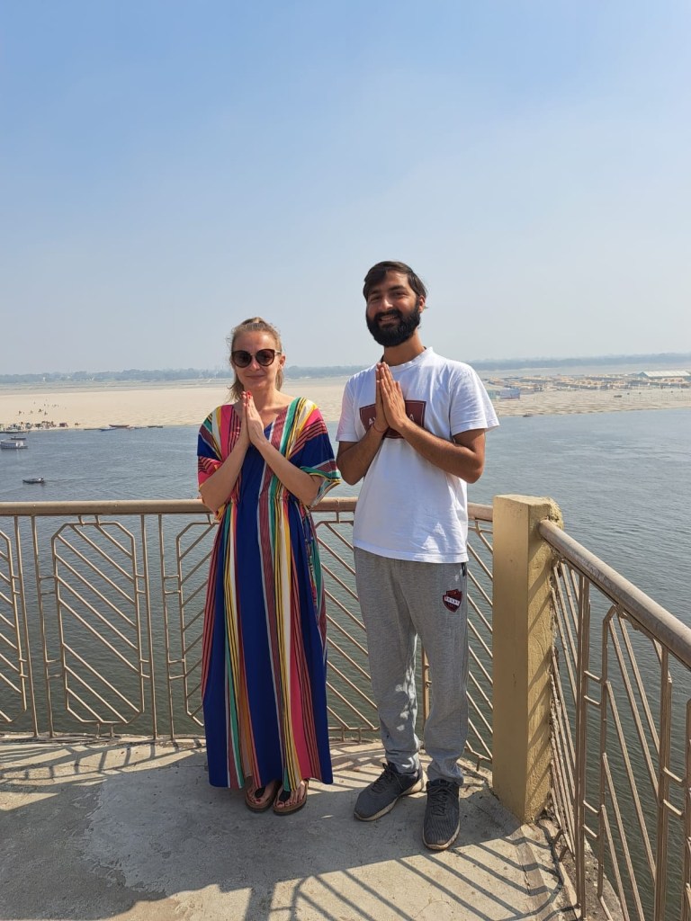 Yoga teacher Ayush with his student in Namaste Mudra. 