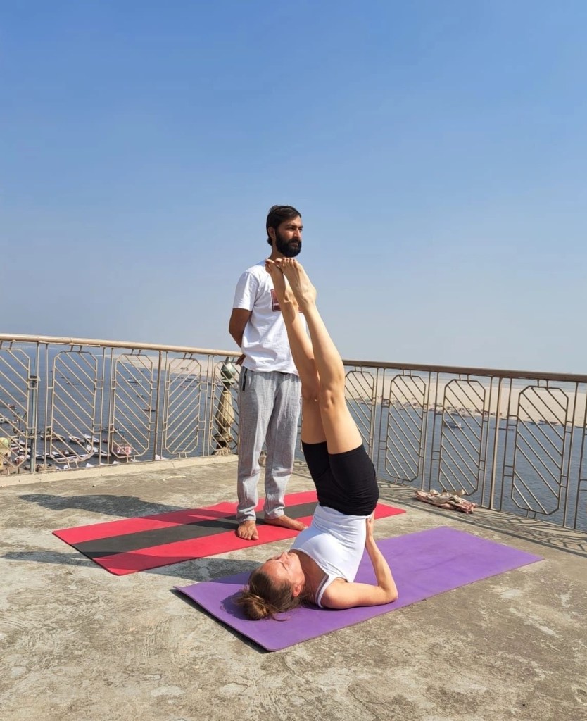 Yoga teacher Ayush student performing Sarvangasana. 
