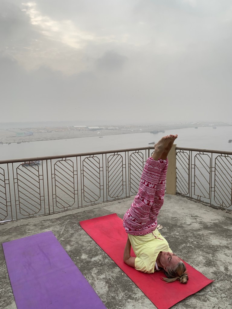 Yoga teacher Ayush student performing Sarvangasana.