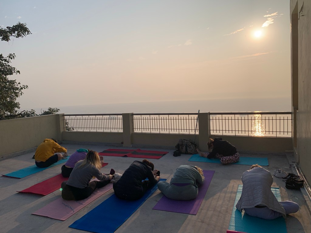 Yoga teacher Ayush students performing Janusirsasana.