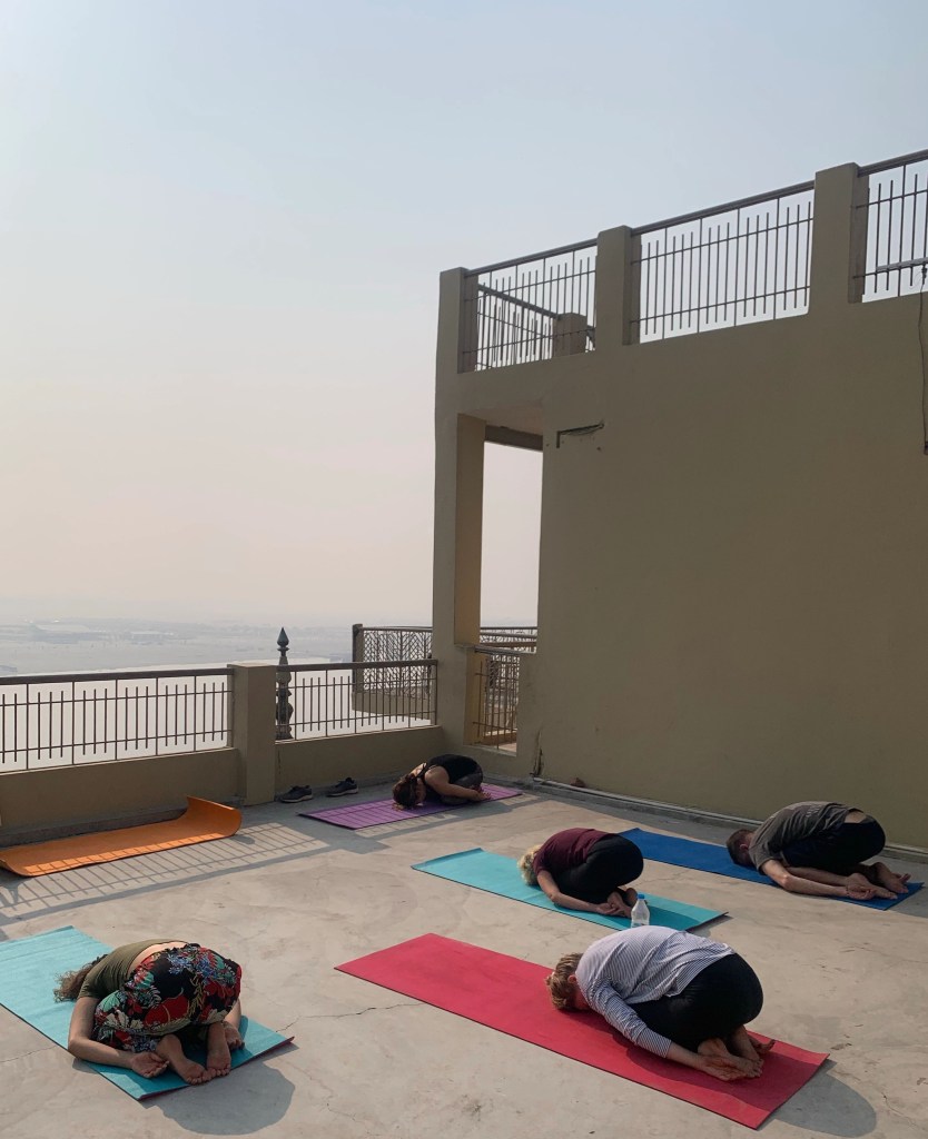 Yoga teacher Ayush students performing Shashankasana.