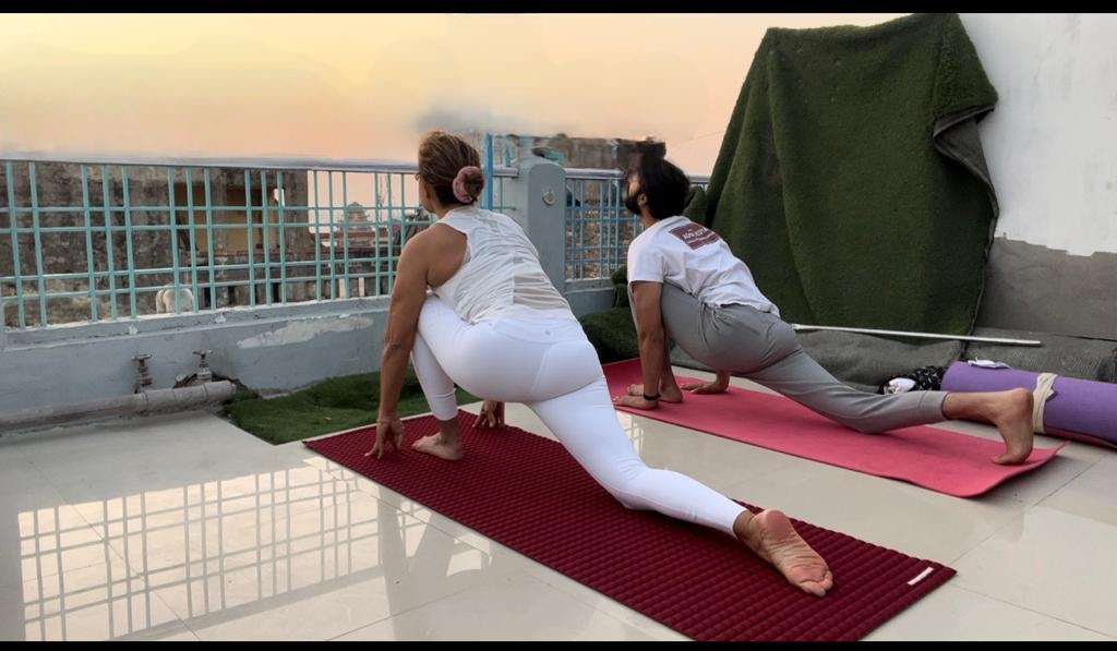 Yoga teacher Ayush with his student in Ashwasanchalan Asan. 
