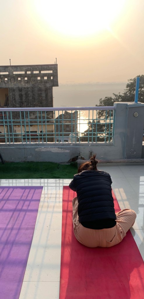 Yoga teacher Ayush student performing Paschimottanasana. 