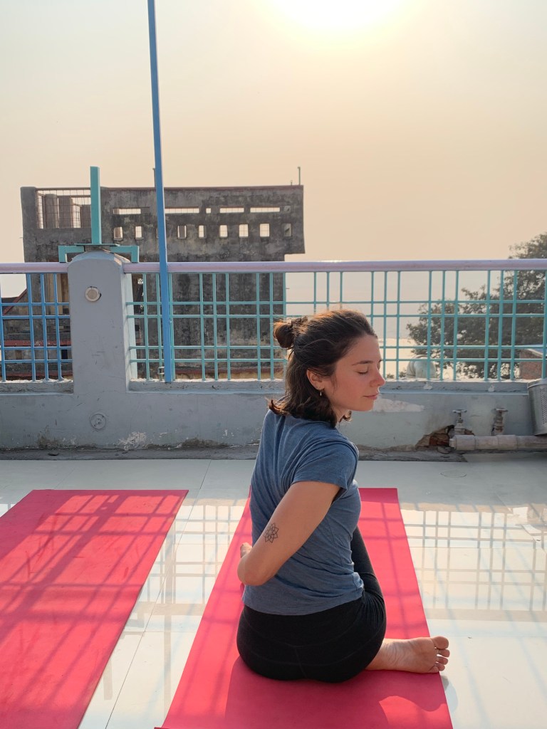 Yoga teacher Ayush student performing Ardhamatsyendrasana.