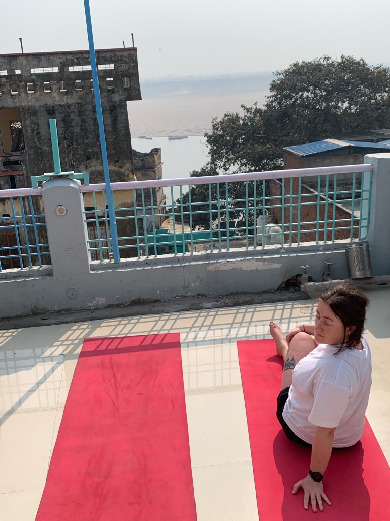 Yoga teacher Ayush students performing Ardhamatsyendrasana. 