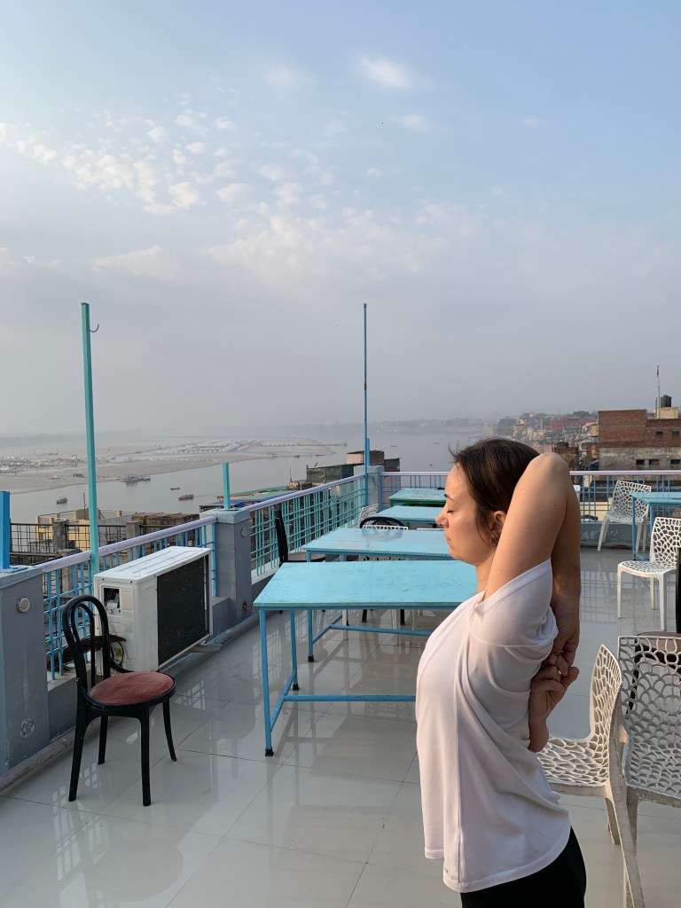 Sunrise Yoga in Varanasi, Gomukhasana (Standing Cow Face Pose)
