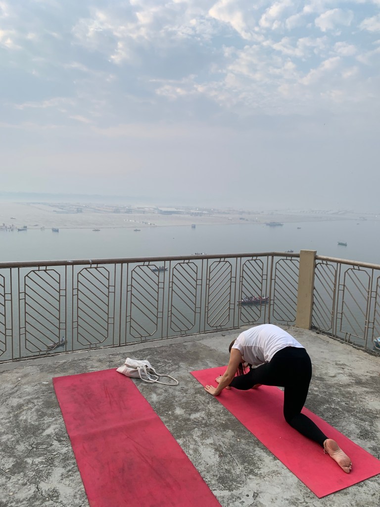 Yoga teacher Ayush student performing Ardha Hanumanasana in Varanasi. 