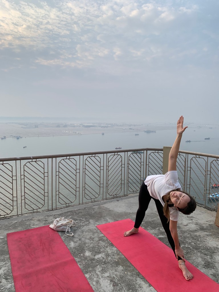 Yoga teacher Ayush student performing Tree Pose in Varanasi. 