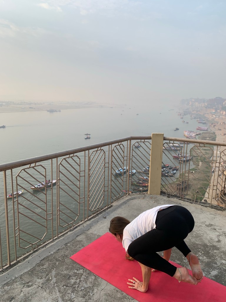 Yoga teacher Ayush student performing Bakasana in Varanasi. 