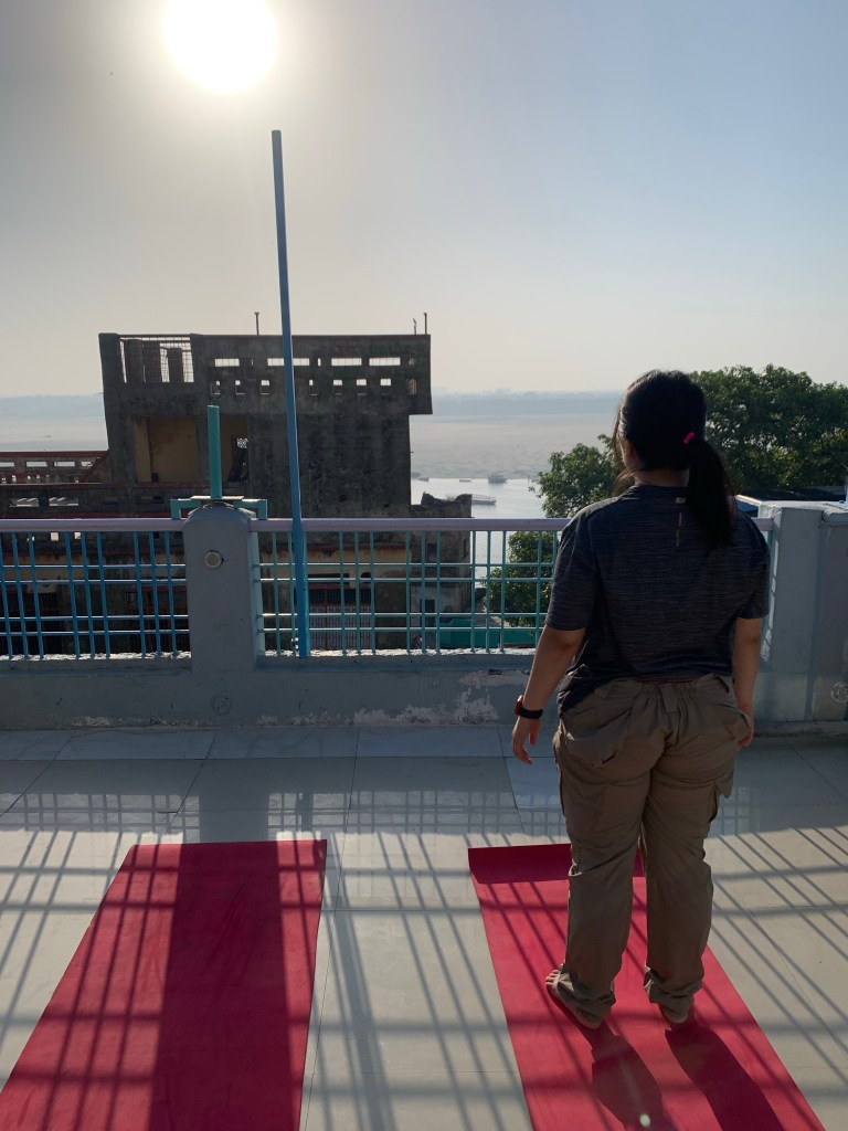 Yoga teacher Ayush student performing Tadasana in Varanasi. 