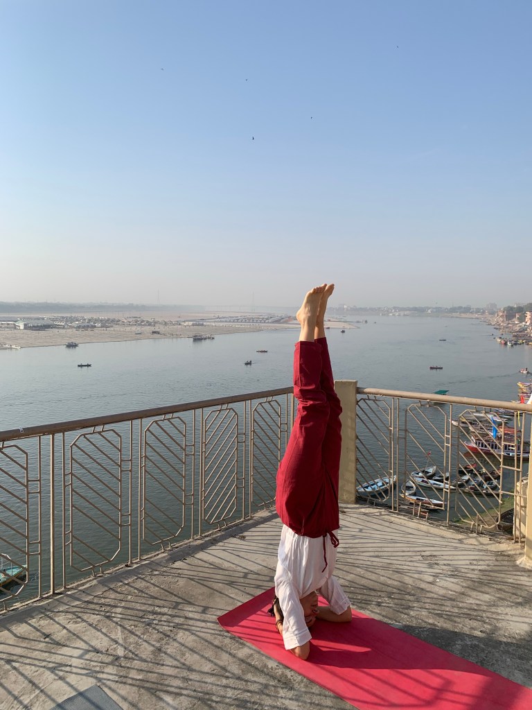 Yoga teacher Ayush student performing Shrishasan in Varanasi.