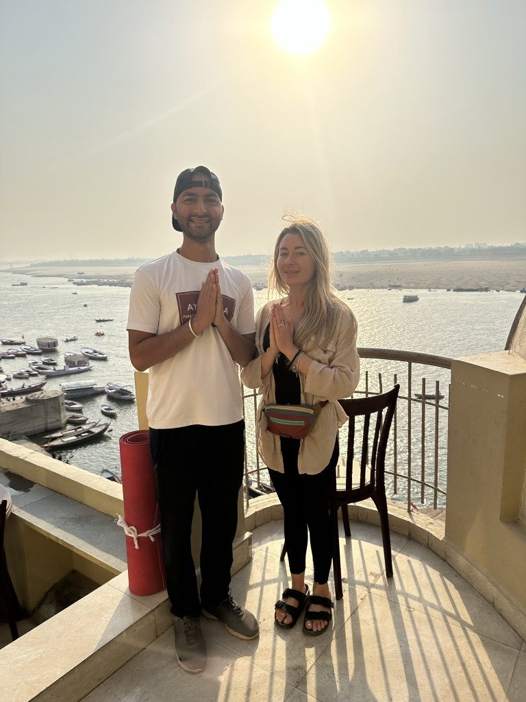 Yoga teacher Ayush with his student in Varnanasi. 