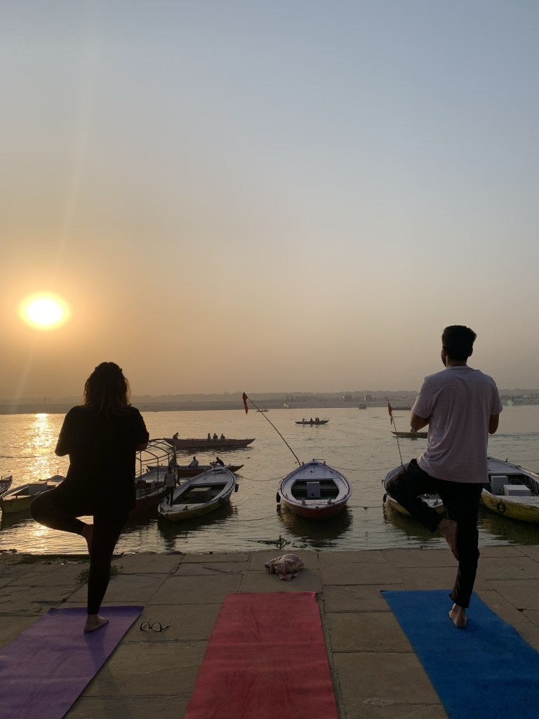 Yoga teacher Ayush student performing Tree Pose in Varanasi. 