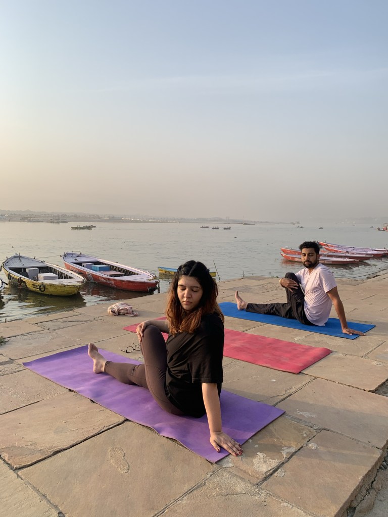 Yoga teacher Ayush student performing Ardhamatsyendrasana in Varanasi. 