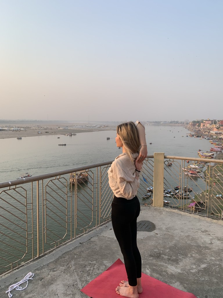 Yoga teacher Ayush student performing Gomukh Asana in Varanasi. 