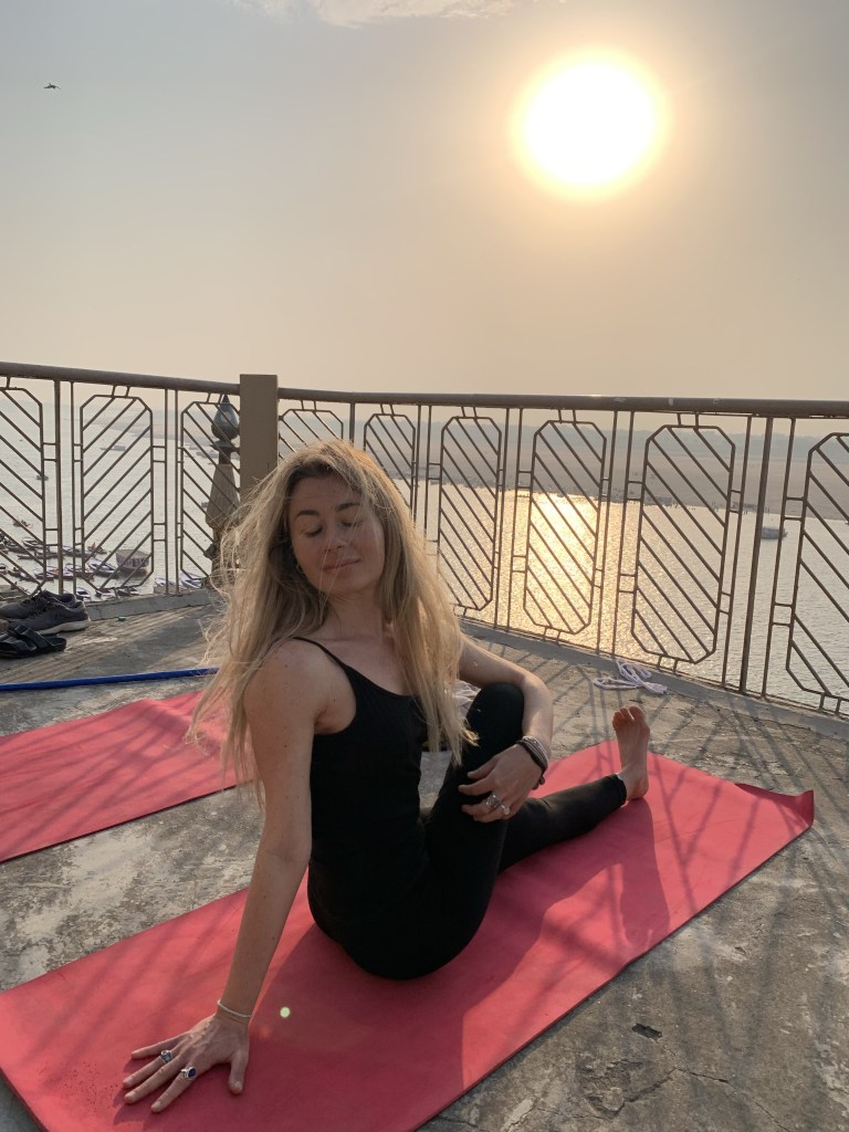 Yoga teacher Ayush student performing Ardhamatsyendrasana in Varanasi. 