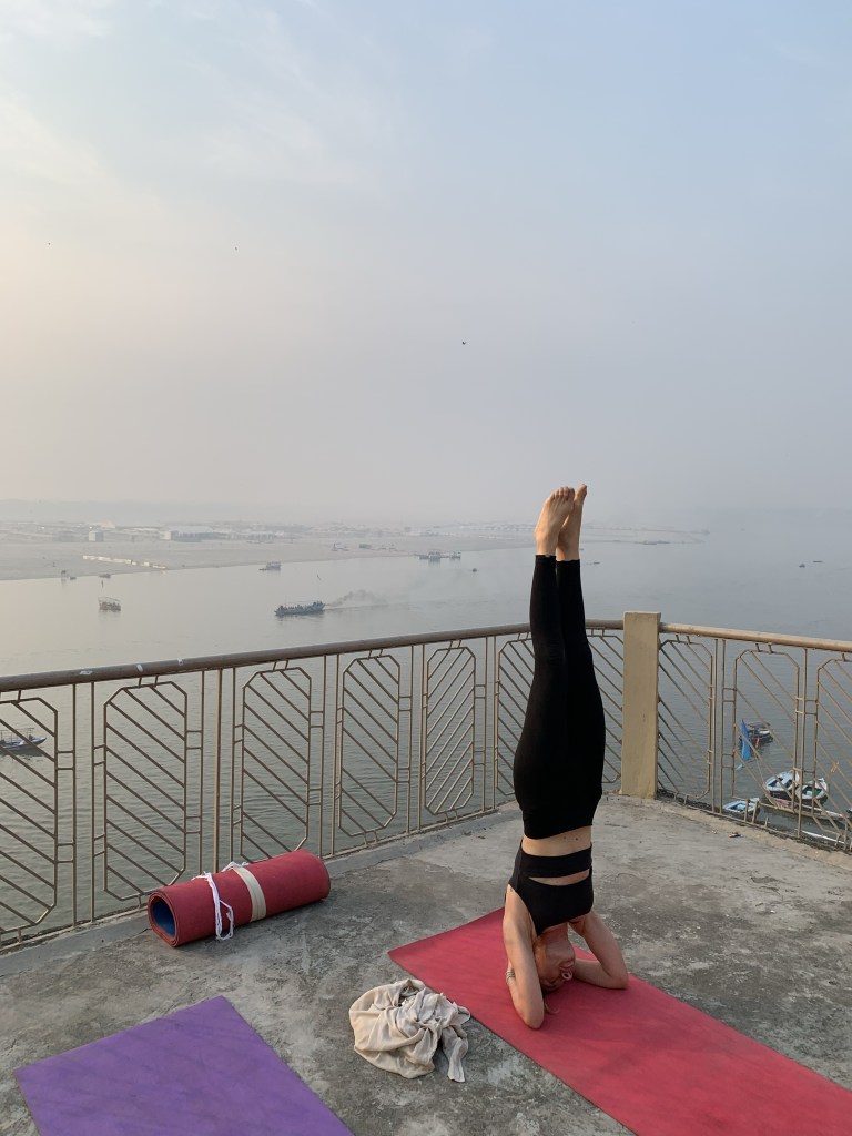 Yoga teacher Ayush student performing Shrishasan in Varanasi. 