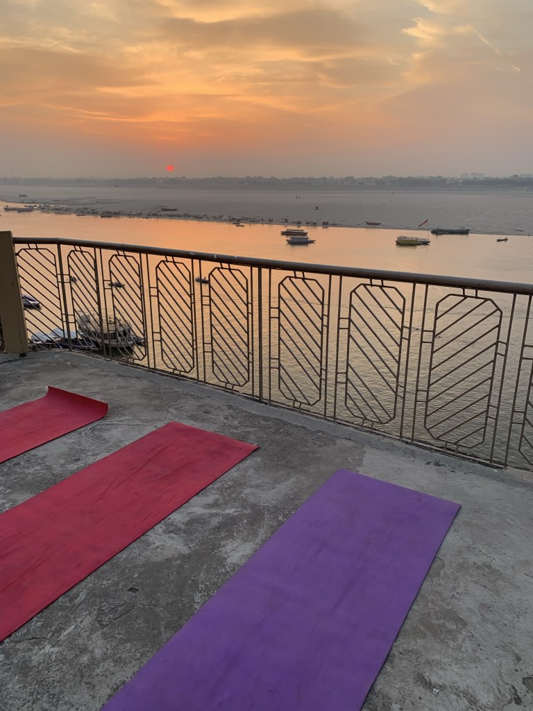 Sunrise Yoga with Ayush in Varanasi over looking Ganga. 